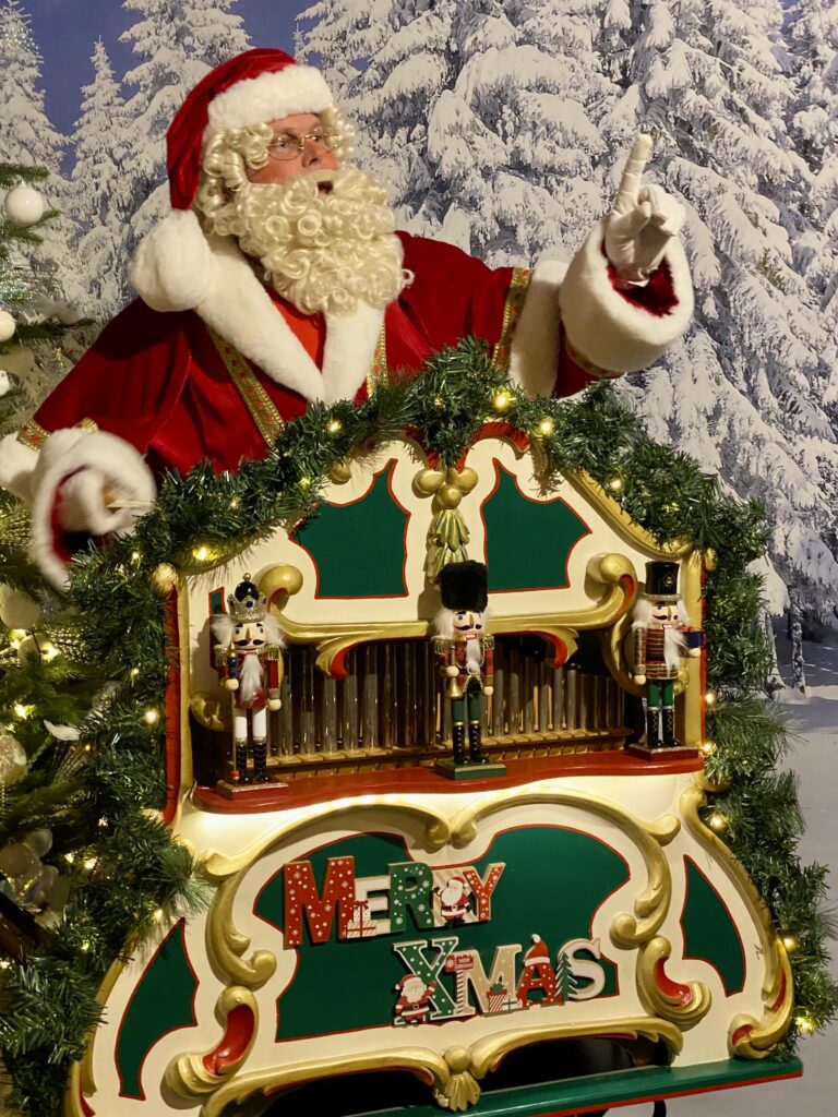 Muzikale Kerstman met kerst draaiorgel